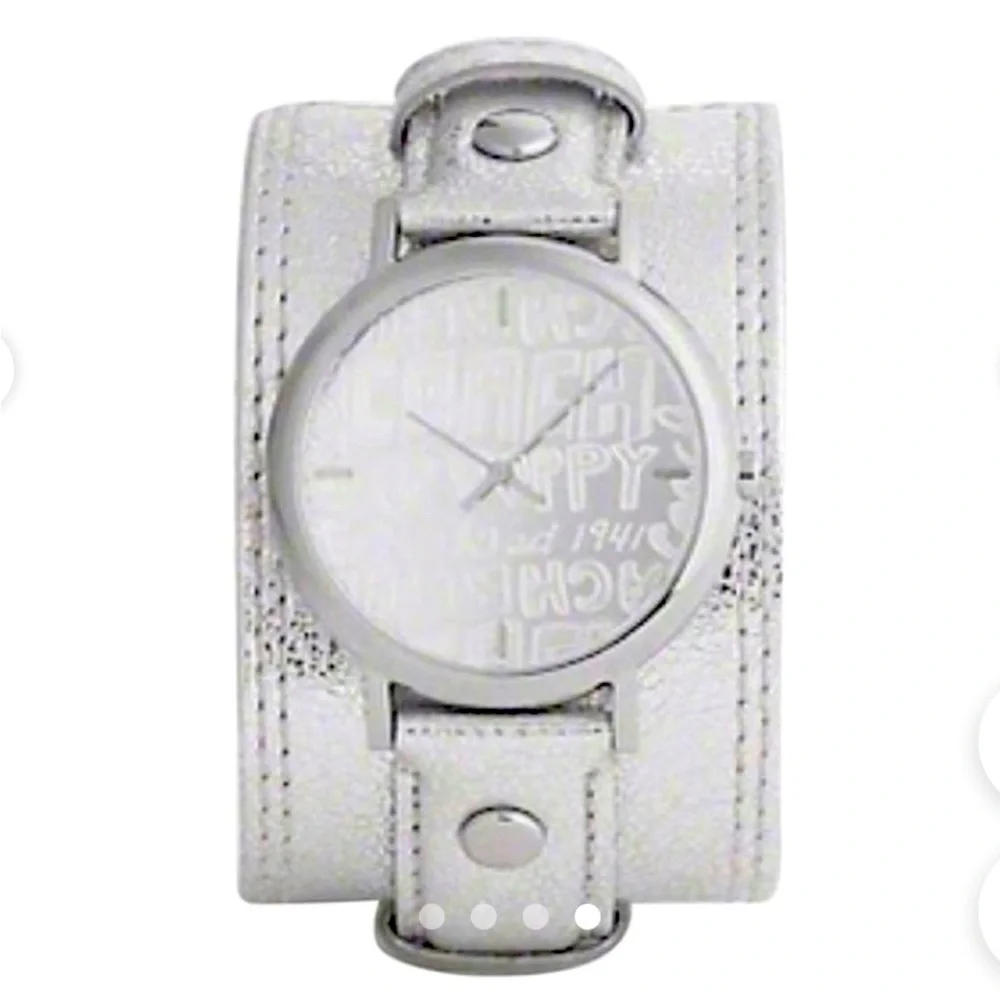 Coach Poppy cuff watch. Genuine leather with silver metallic‎ design. Vintage